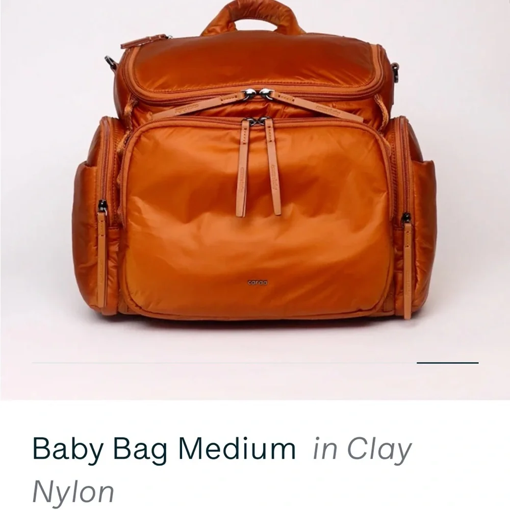 caraa Medium Baby Bag in Clay Orange